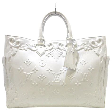 white leather louis vuitton bag|Louis Vuitton embossed leather bag.